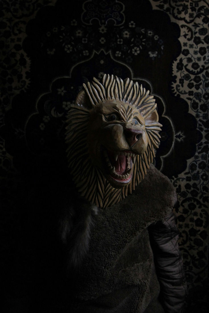 Self-portrait. I put on a lion mask and I want to protect myself, protect a little five-year-old girl.